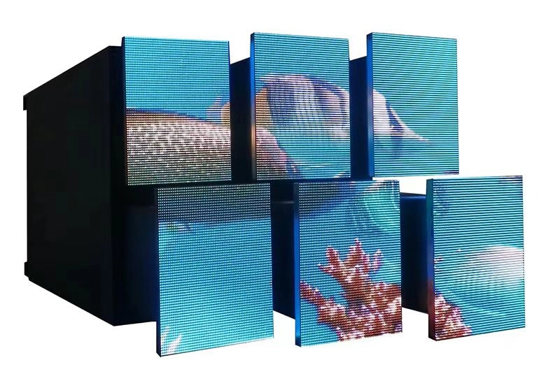 Kinetic LED tiles pushed to staggered depths forming a 3D relief image